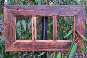 Wide 3 opening photo frame which hangs horizontally and vertically. Made in Recycled Australian timber. Has rustic nail holes