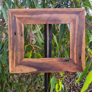 Wooden picture frames 9cms wide in recycled Australian hard wood with nail holes here in A4 size brown gum