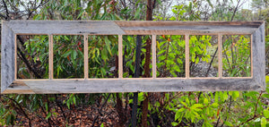 Rustic wooden photo frame, a grey fence paling and beach look for 7 pictures in a row made at WombatFrames