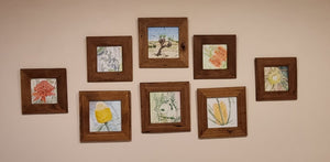 Square picture frames in recycled Australian hardwood, here a selection of different sizes with artworks inside. 