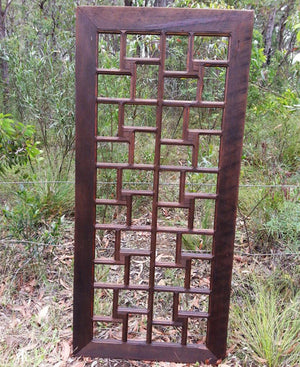 Dark timber picture frame made in recycled oregon timber with 40 openings for large photo collage