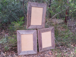 Wide recycled timber picture frames with a rustic grey fence look perfect for art, wedding photography and award certificates